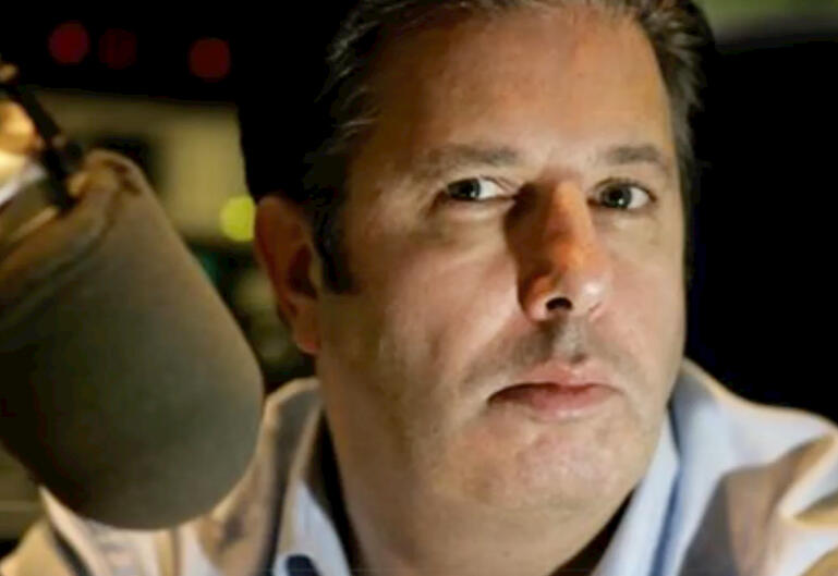 image of man looking out through a window on the universe